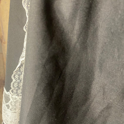 Black skirt with white lace details
