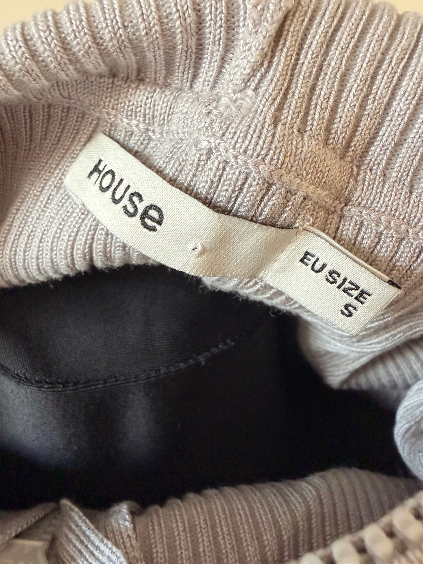 Light gray zip-up jacket