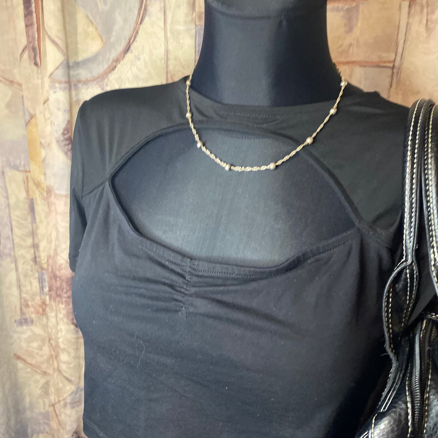 Black top with mesh sleeves