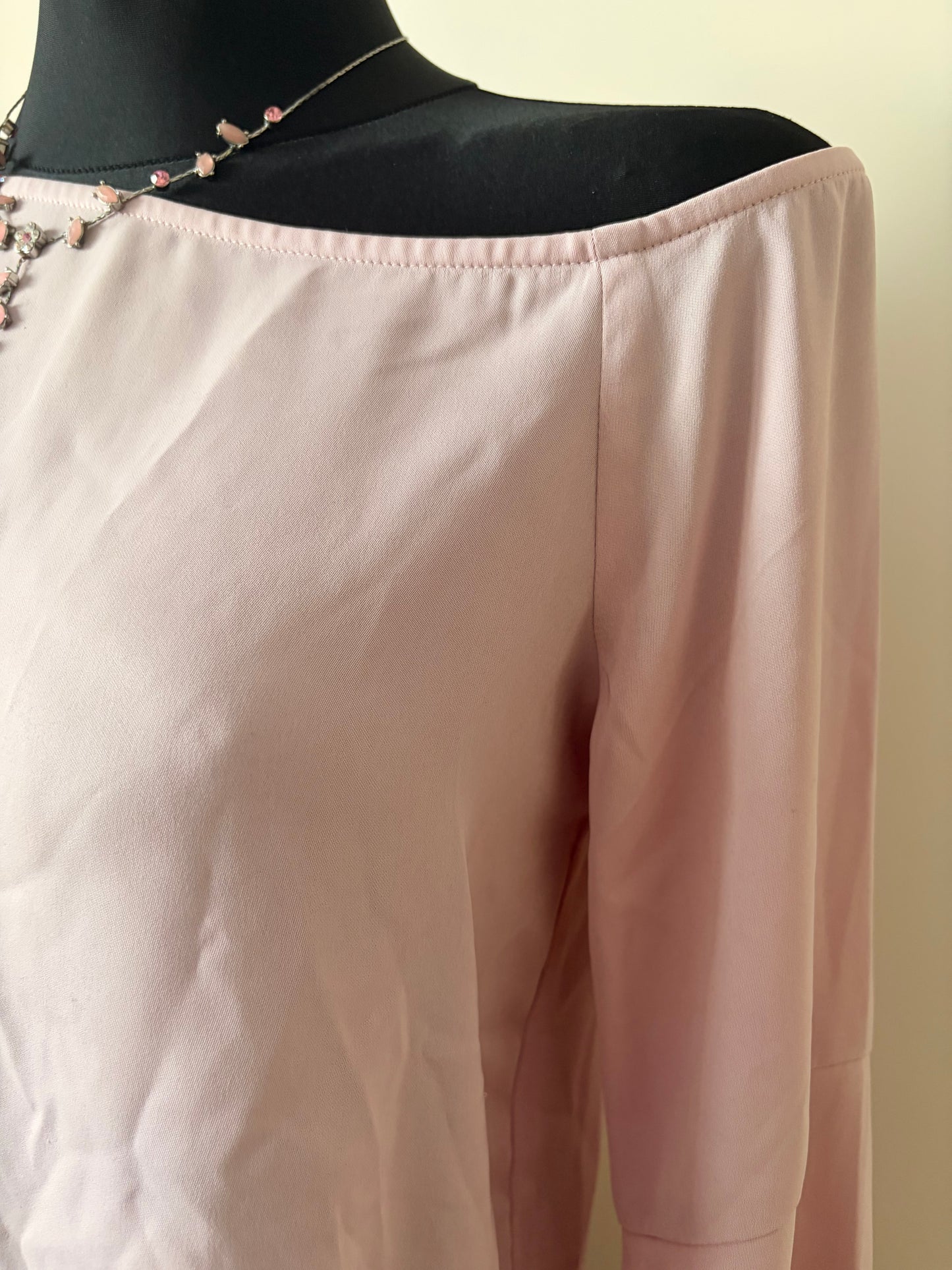 Light pink off-shoulder blouse