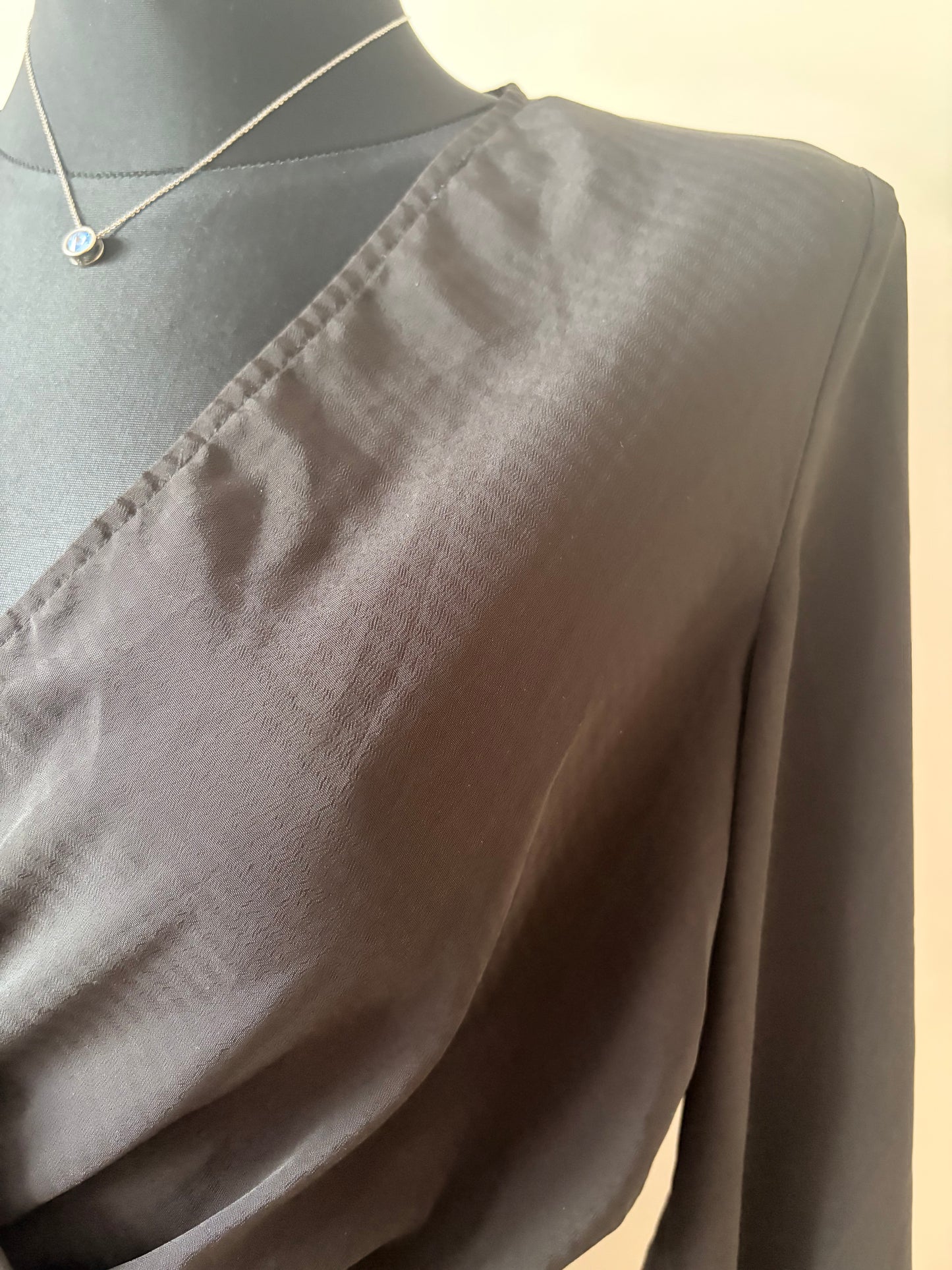 Black wrap-like crop blouse