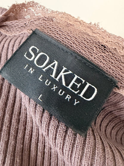 Dark pink knit top with lace details