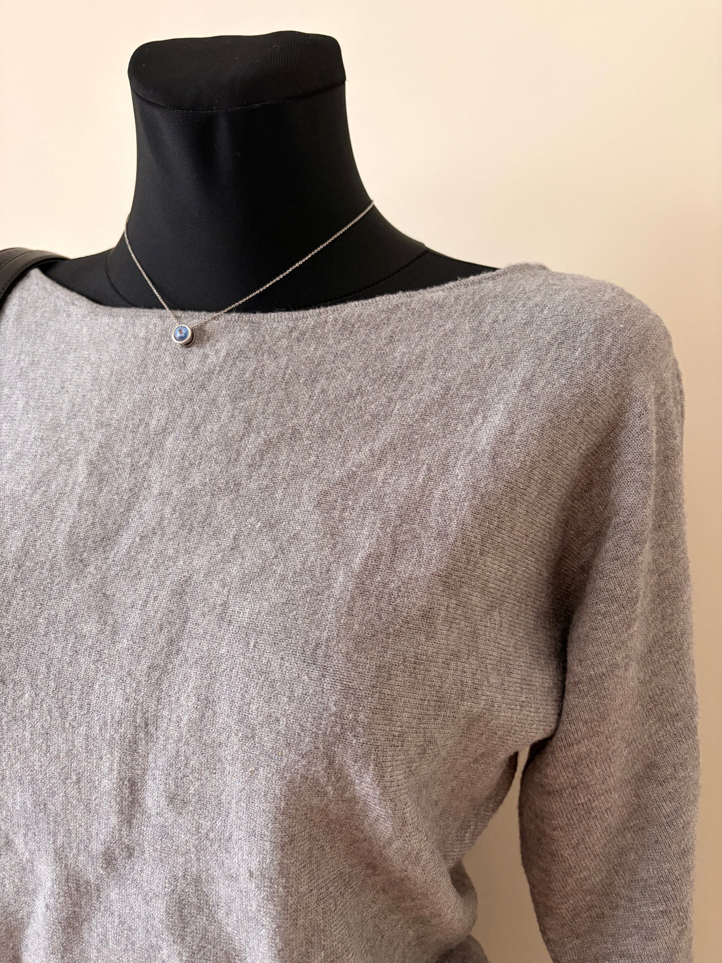 Grey open-back sweater
