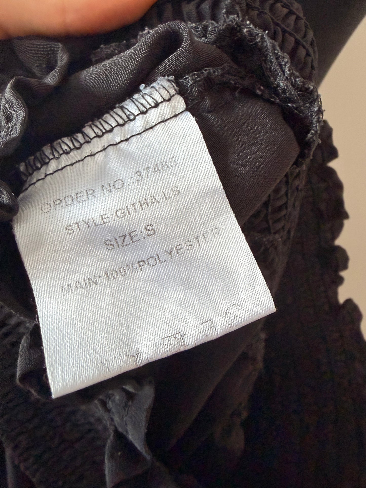 Black wrap-like crop blouse