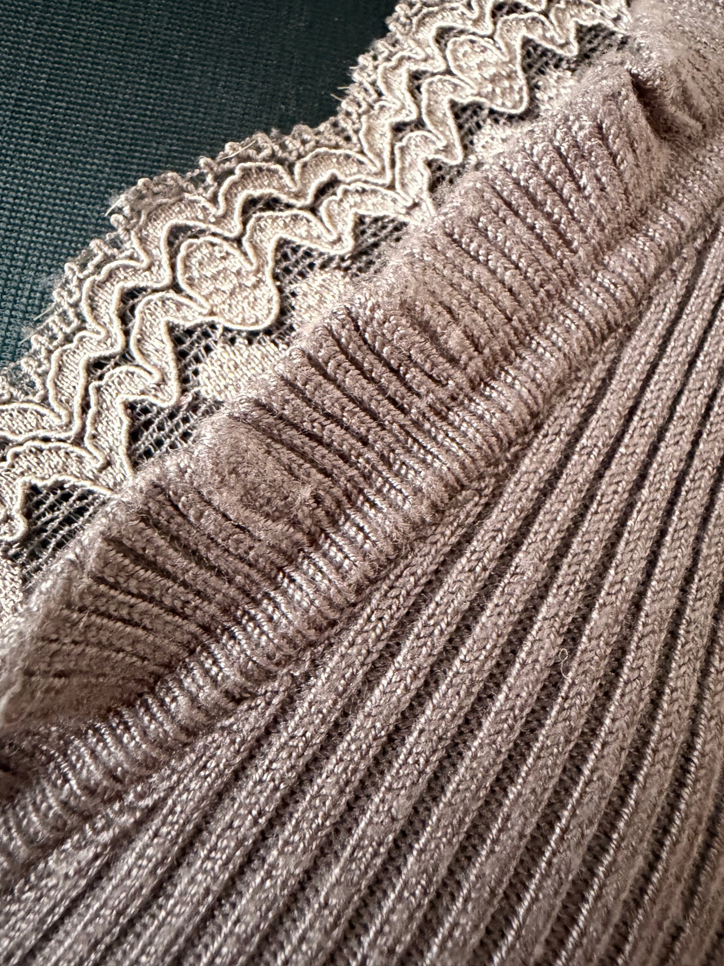 Dark pink knit top with lace details
