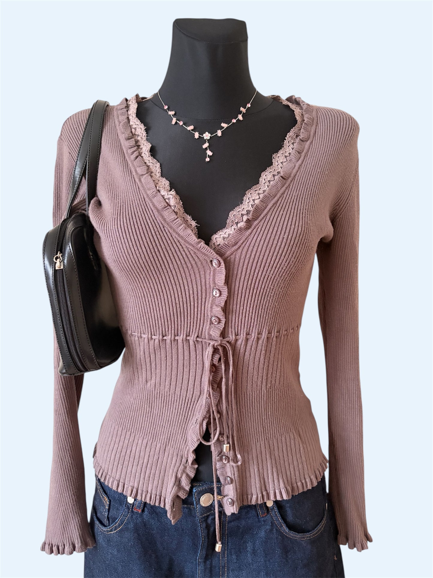 Dark pink knit top with lace details